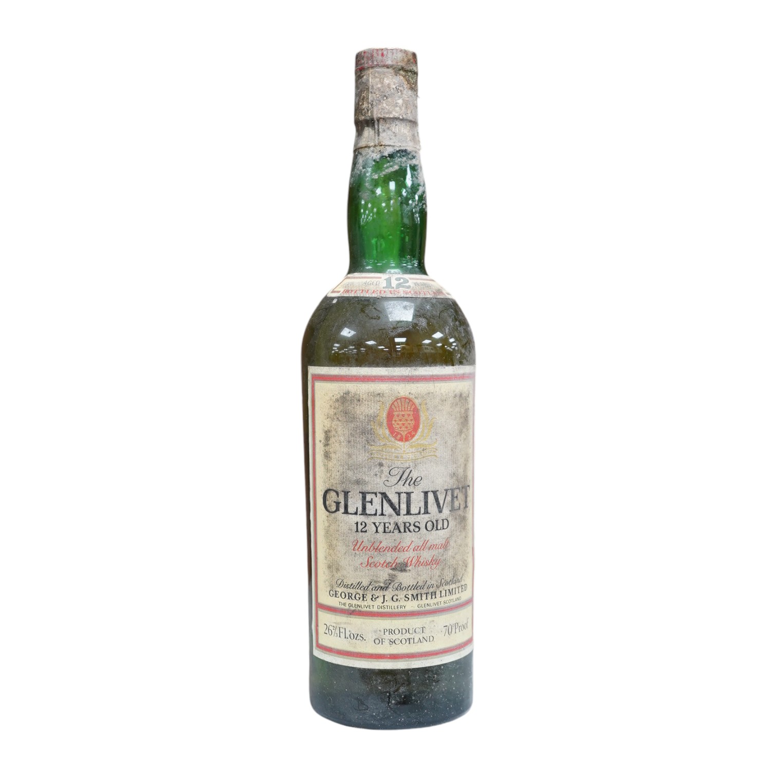 A vintage bottle of The Glenlivet 12 year old single malt whisky, 26 2/3 Fl oz. Condition - fair to good, storage unknown